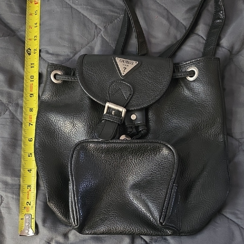 vintage 1990s GUESS USA black pebble leather buckle drawstring backpack.